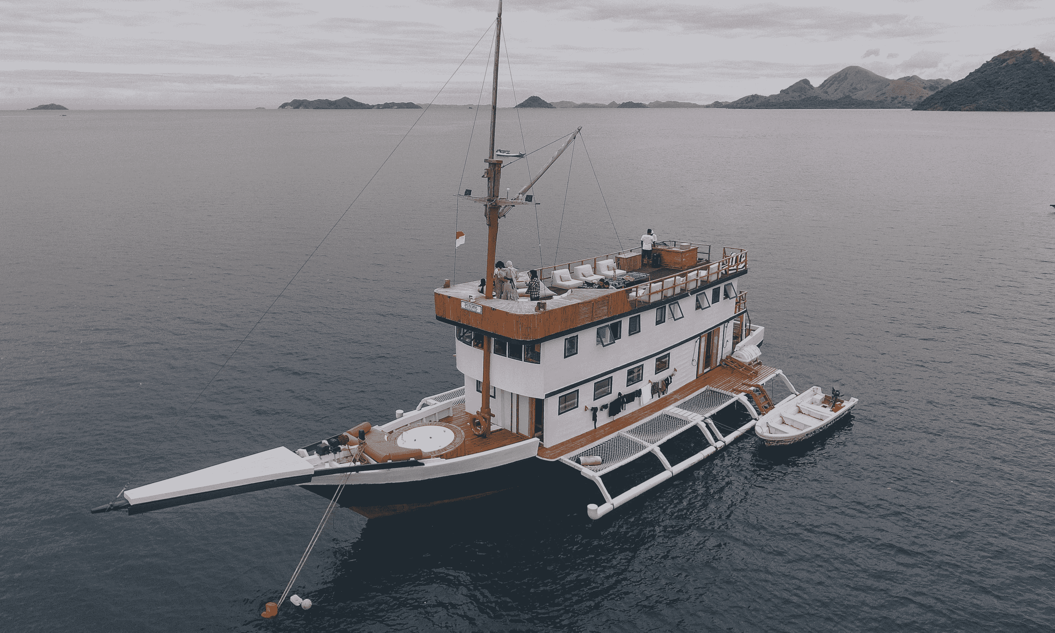 Sea Familia I at anchor in calm Komodo waters